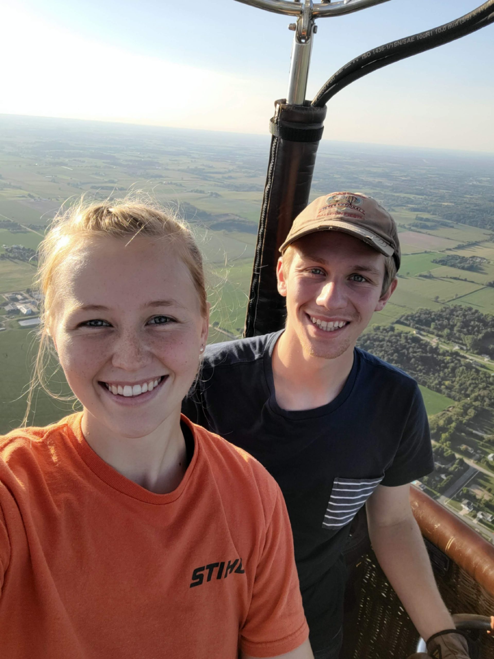 Sam and Landon Kohtz in the basket of their hot air balloon